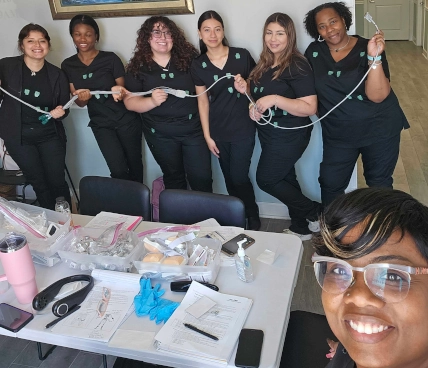 Medical assistants posing outside between lessons